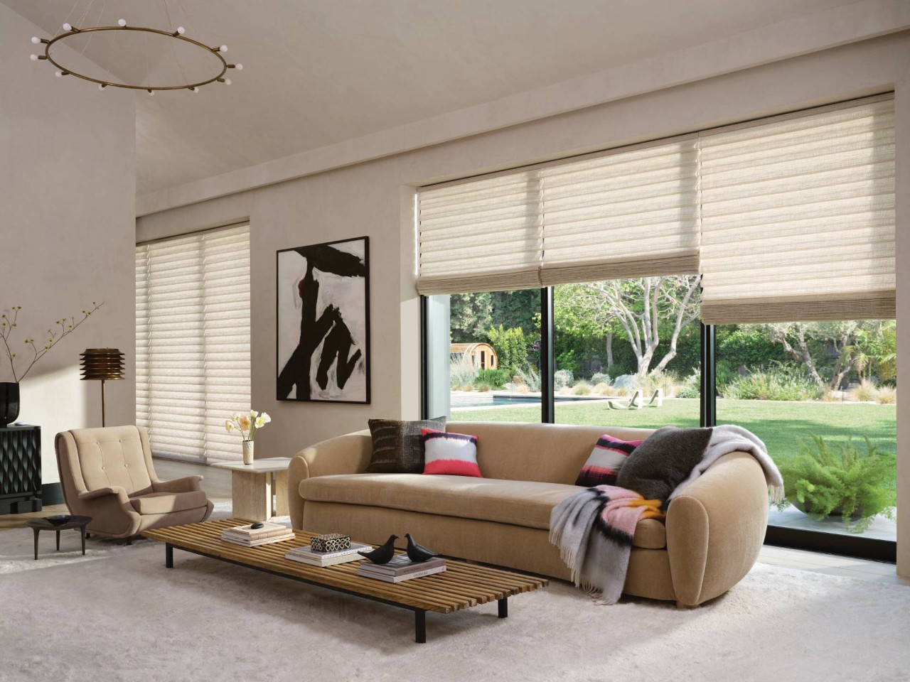 Modern living room outfitted with cream-colored Hunter Douglas Vignette® Roman Shades near Jupiter, FL