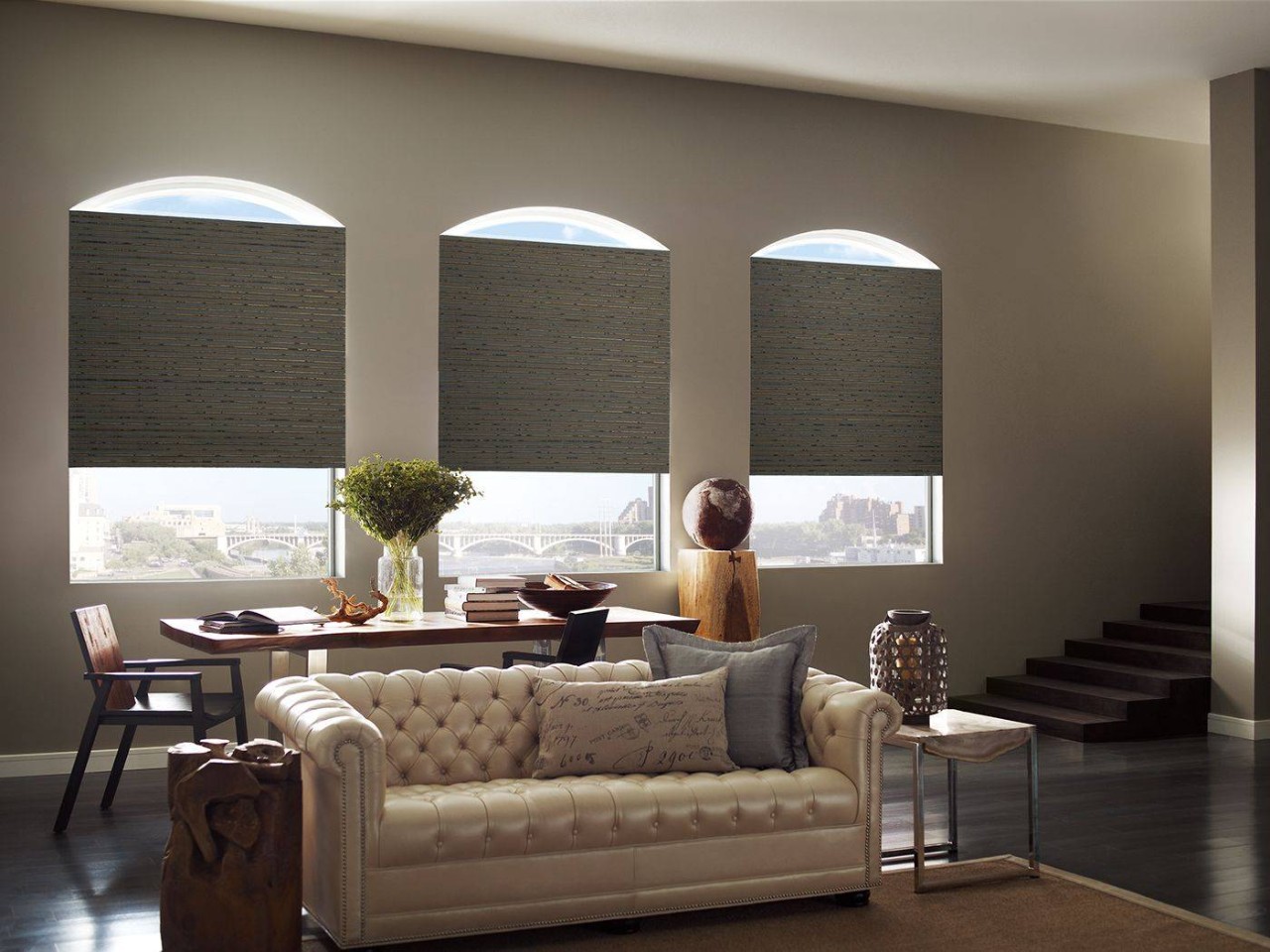 Hunter Douglas Provenance® Woven Wood Shades decorating three arched windows near Jupiter, Florida