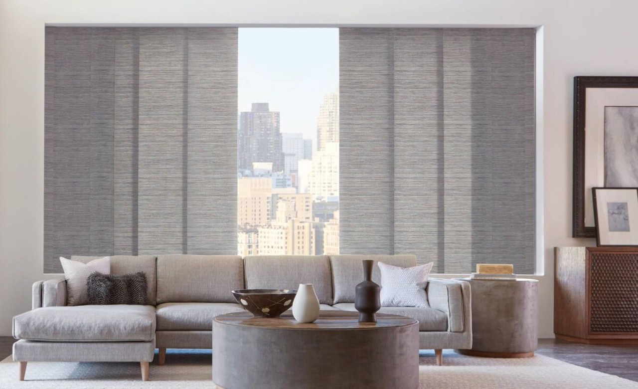 Hunter Douglas Skyline® Panel Track Blinds decorating a sleek, modern apartment near Jupiter, FL