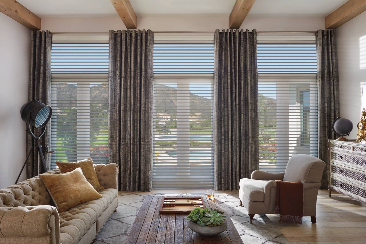 Light blocking Hunter Douglas blinds decorating a home living room near Jupiter, Florida